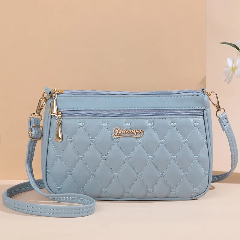 Bolsa de mão super fashion feita de couro, vários modelos.