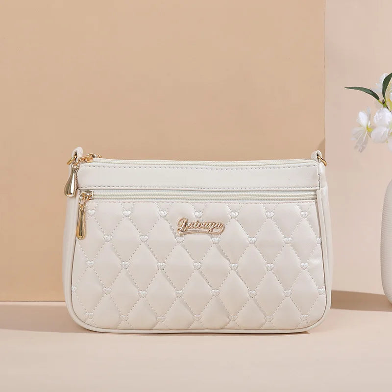 Bolsa de mão super fashion feita de couro, vários modelos.